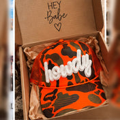 Howdy Patch Trucker Hat | Hunter Orange Camo - trucker hat