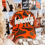 Howdy Patch Trucker Hat | Hunter Orange Camo