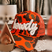 Howdy Patch Trucker Hat | Hunter Orange Camo - trucker hat