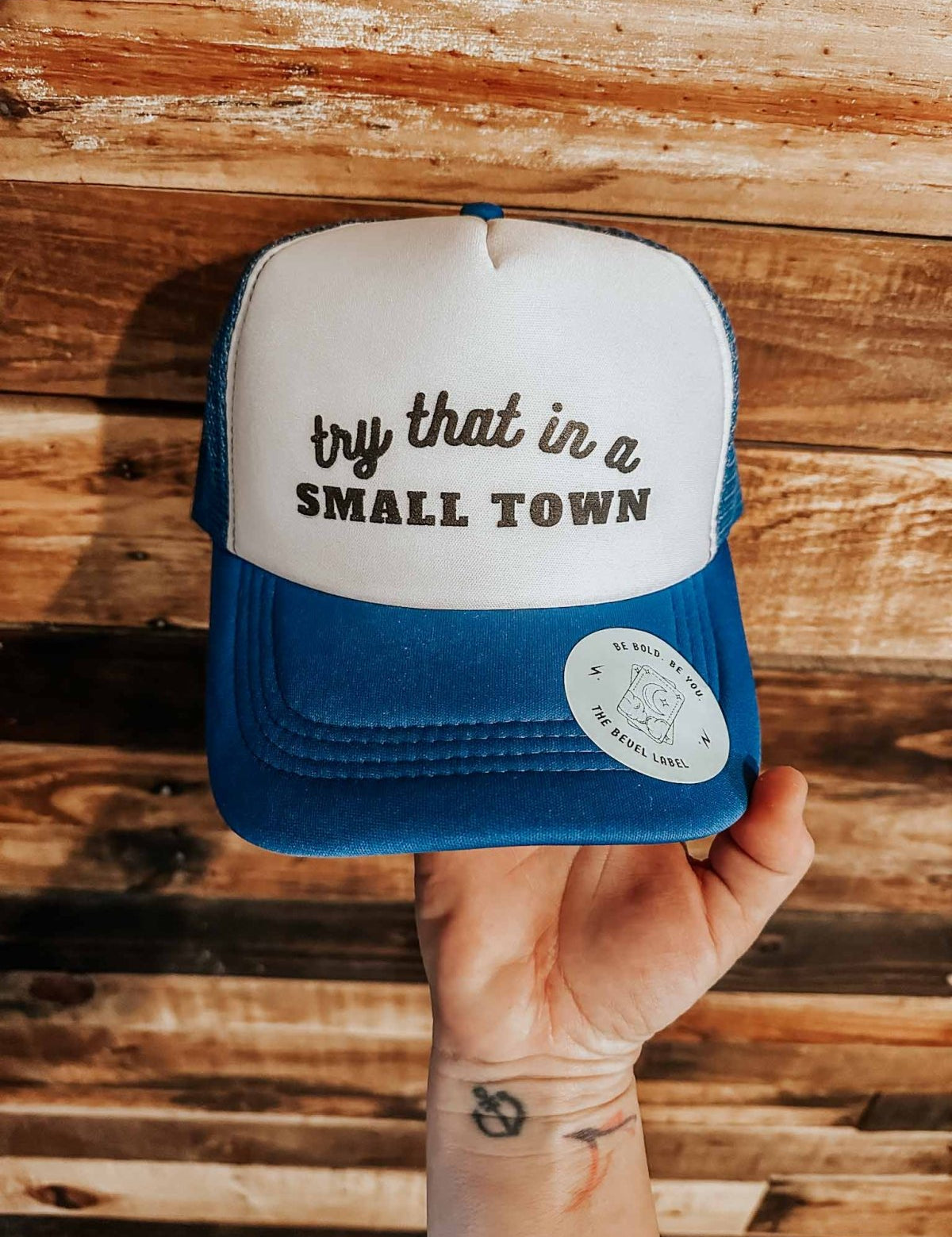Try that in a small town hat - trucker hat
